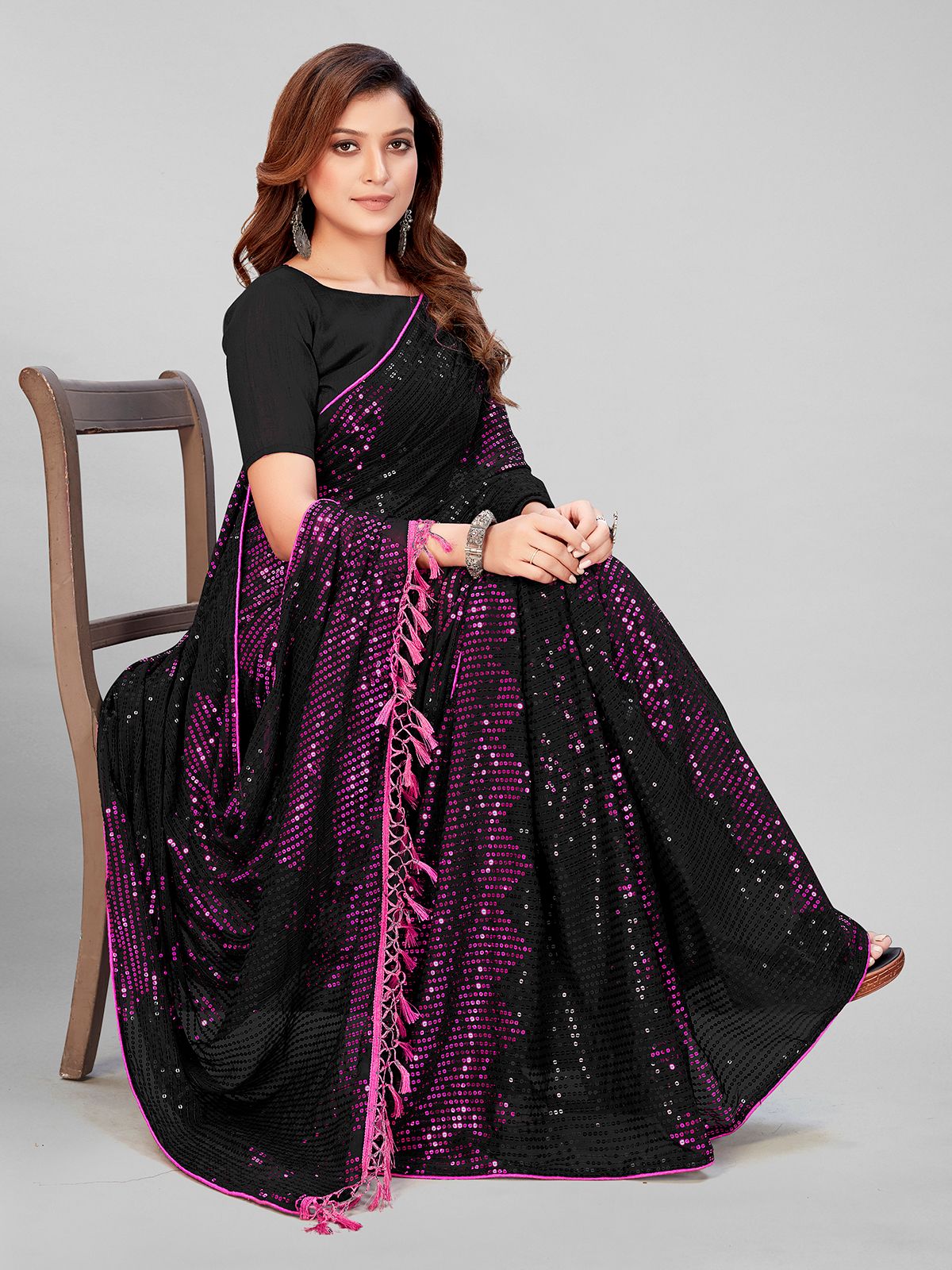 Fancy Sequined Embroidered Black Coloured Georgette Saree with Blouse Piece